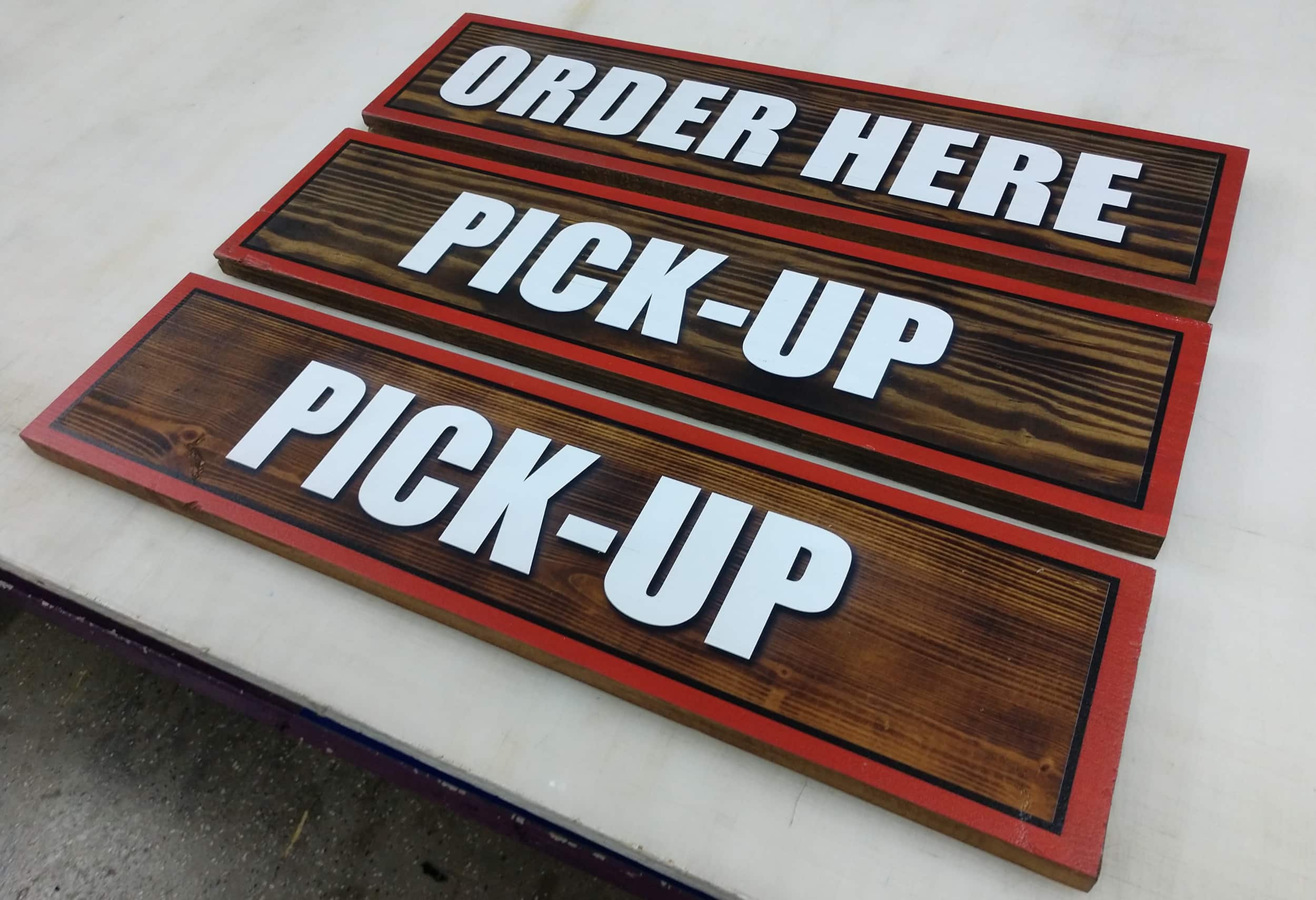 This multi-dimensional, printed text on wood signs was created to elevate a standard project for a client.