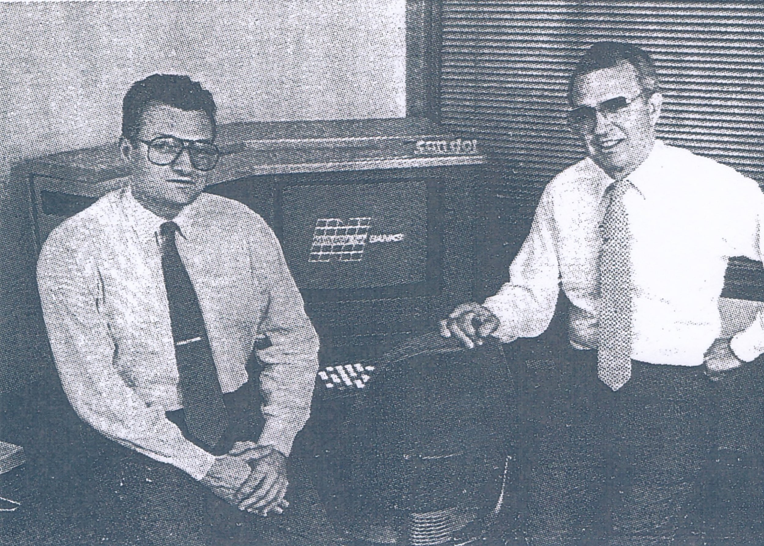 Rock LaManna (left) and Carlo LaManna with first CAD/CAM system at Vomela.